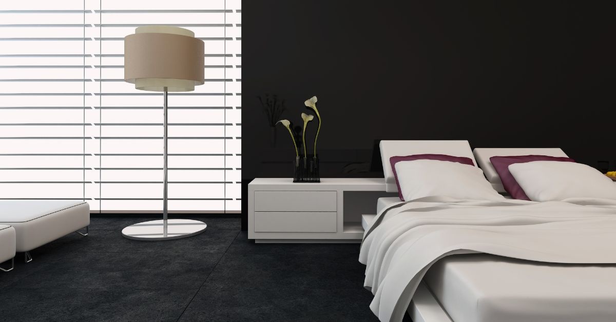 A wooden table with 4 brown chairs around and dishes on top of the table